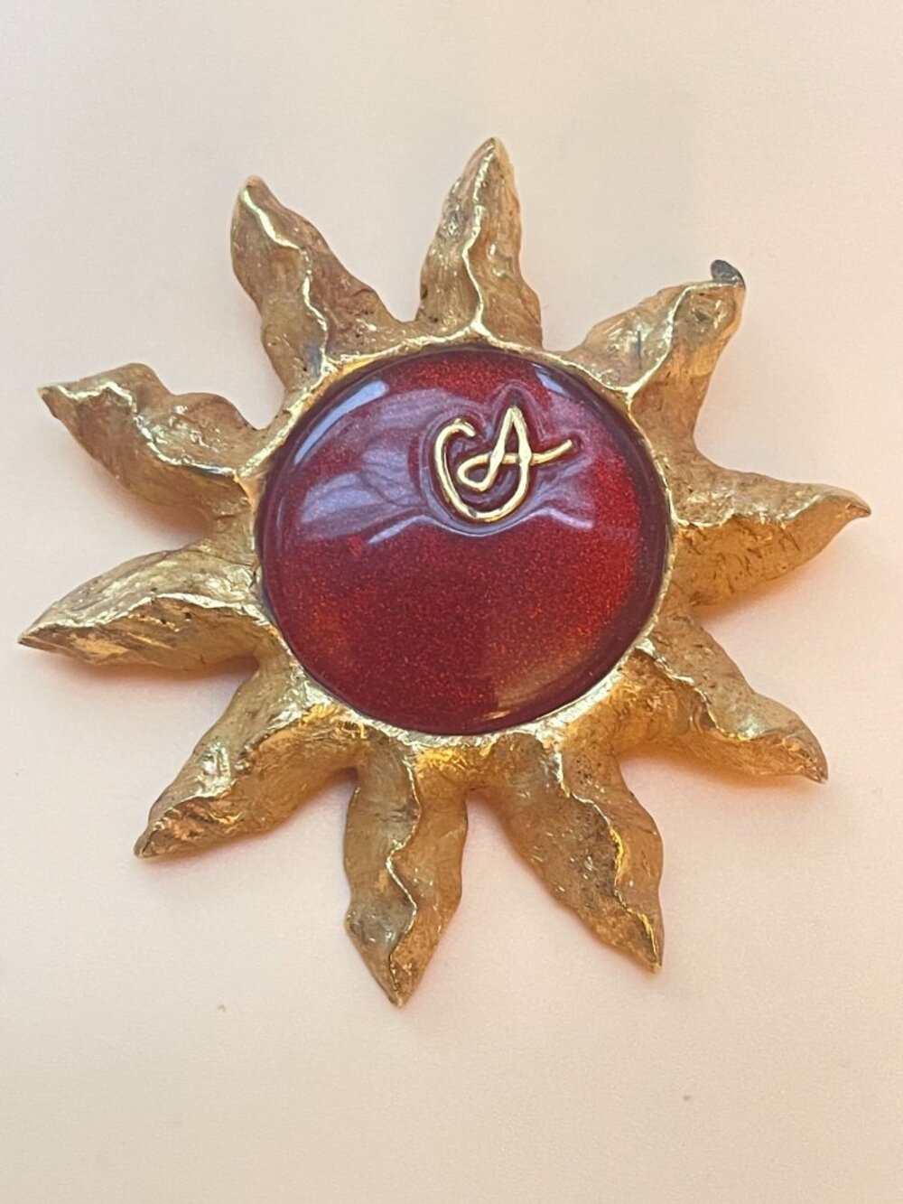 Christian Lacroix Gold-Tone Sun Brooch W/ Red Resin Center & Golden Logo
